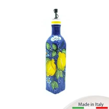 Bottiglia quadrata cm.25 con decoro limone e fondo blu più versatoio.