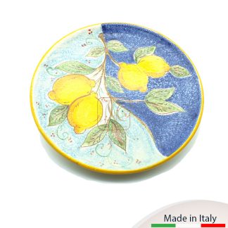 Piatto murale cm.25 con decoro limone e fondo bicolore su effetto buccia d'arancia.
